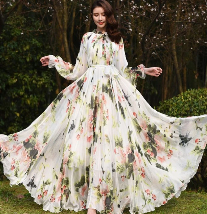 Flowered chiffon gowns with long sleeves and flowing floral skirts.
