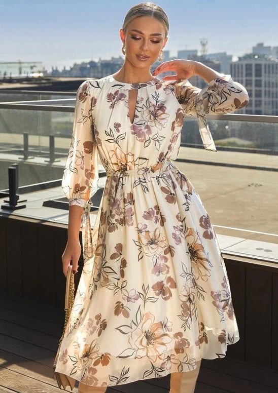 Flowing chiffon fabric creates movement and elegance in floral gowns.